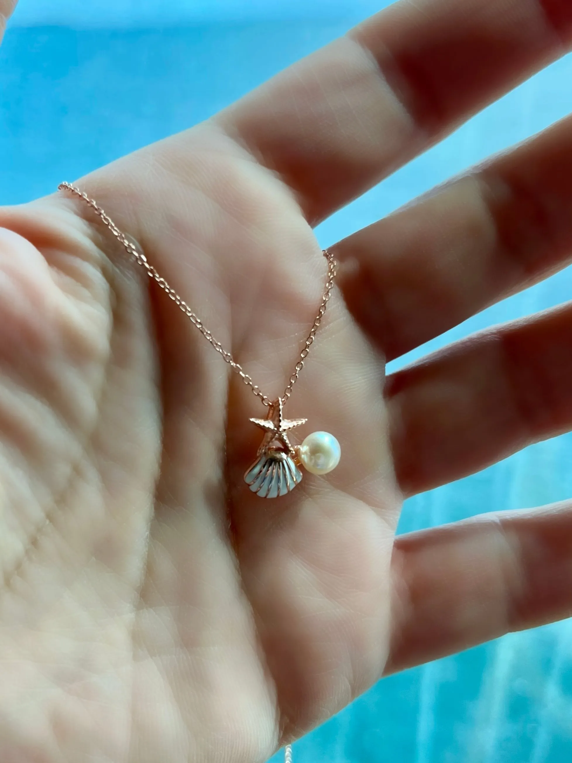 Seashell and starfish necklaces with pearls